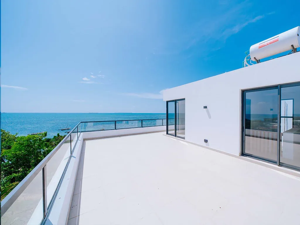 Ocean view with cumulus clouds and handrail from 5-bedroom townhouse balcony in Zanzibar, Zanzibar, Tanzania