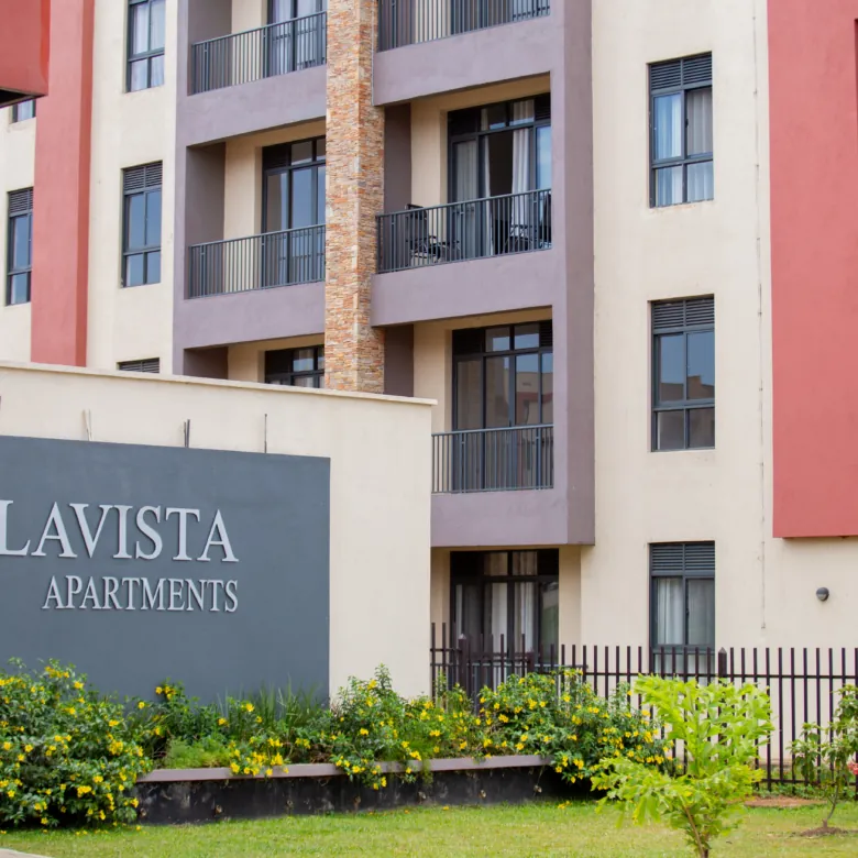 Modern 2-bedroom apartment living room with open-plan design in Kisubi, Busiiro, Uganda